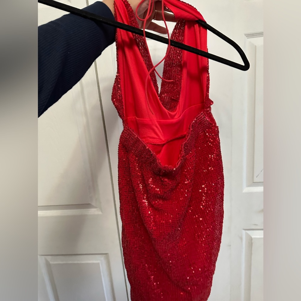 Red body con dress , open back , strap